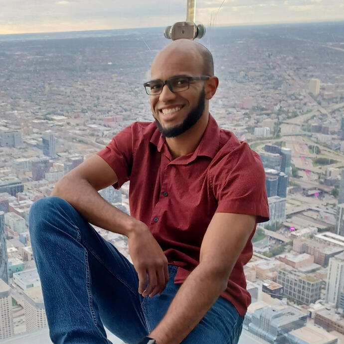 Photo of Young Guy with Skyline Background